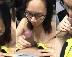 Em gái kính cận nhẹ nhàng chăm chút thằng em bên bàn làm việc | VIET69